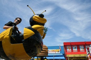 Author Tony O'Neill on a bee (at a fair).